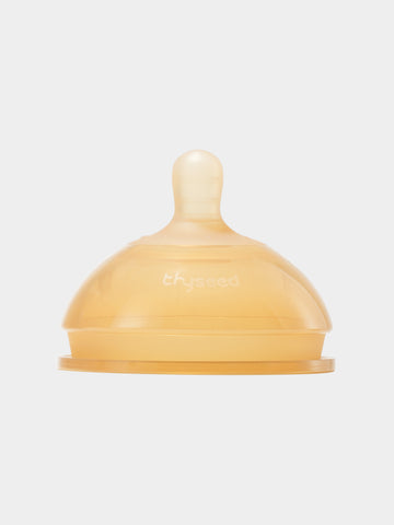 Thyseed brand baby bottle nipple made of food-grade liquid silicone in a skin-like color.