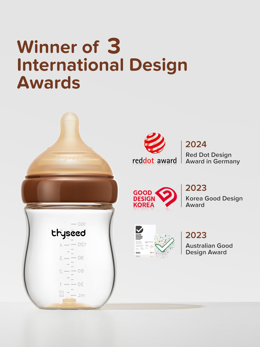 Thyseed glass anti-colic baby bottle with brown collar and beige nipple, showing airflow through the vent.