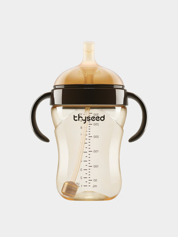 Thyseed 10oz PPSU learner cup with weighted straw and angled handles in amber color.